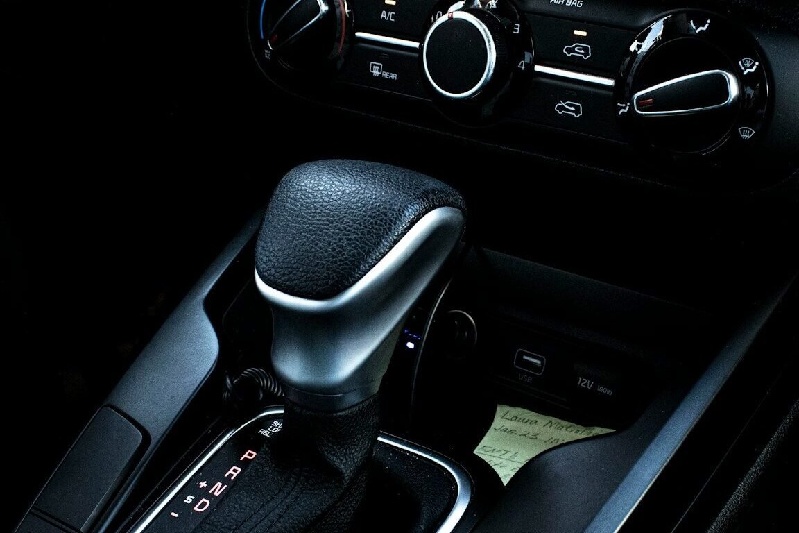 a close up of a steering wheel in a car